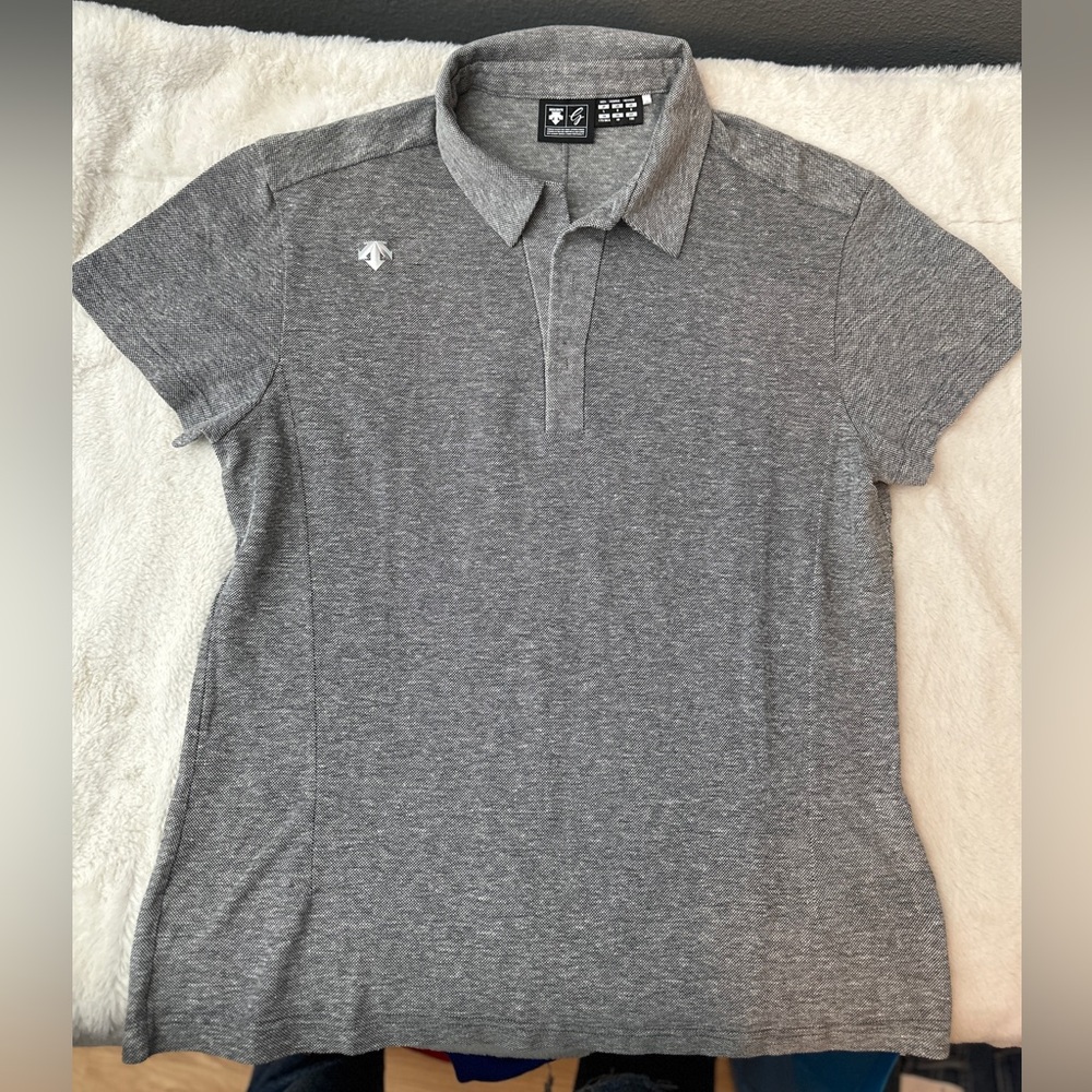 Men’s Descente gold polo shirt